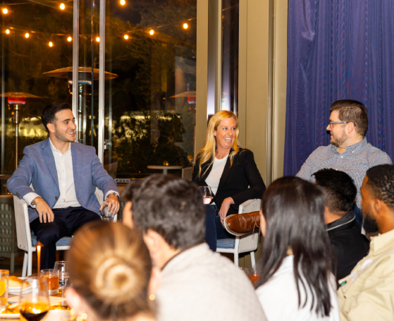 Brandon leading a discussion with clients at ApparelMagic Summit 2025